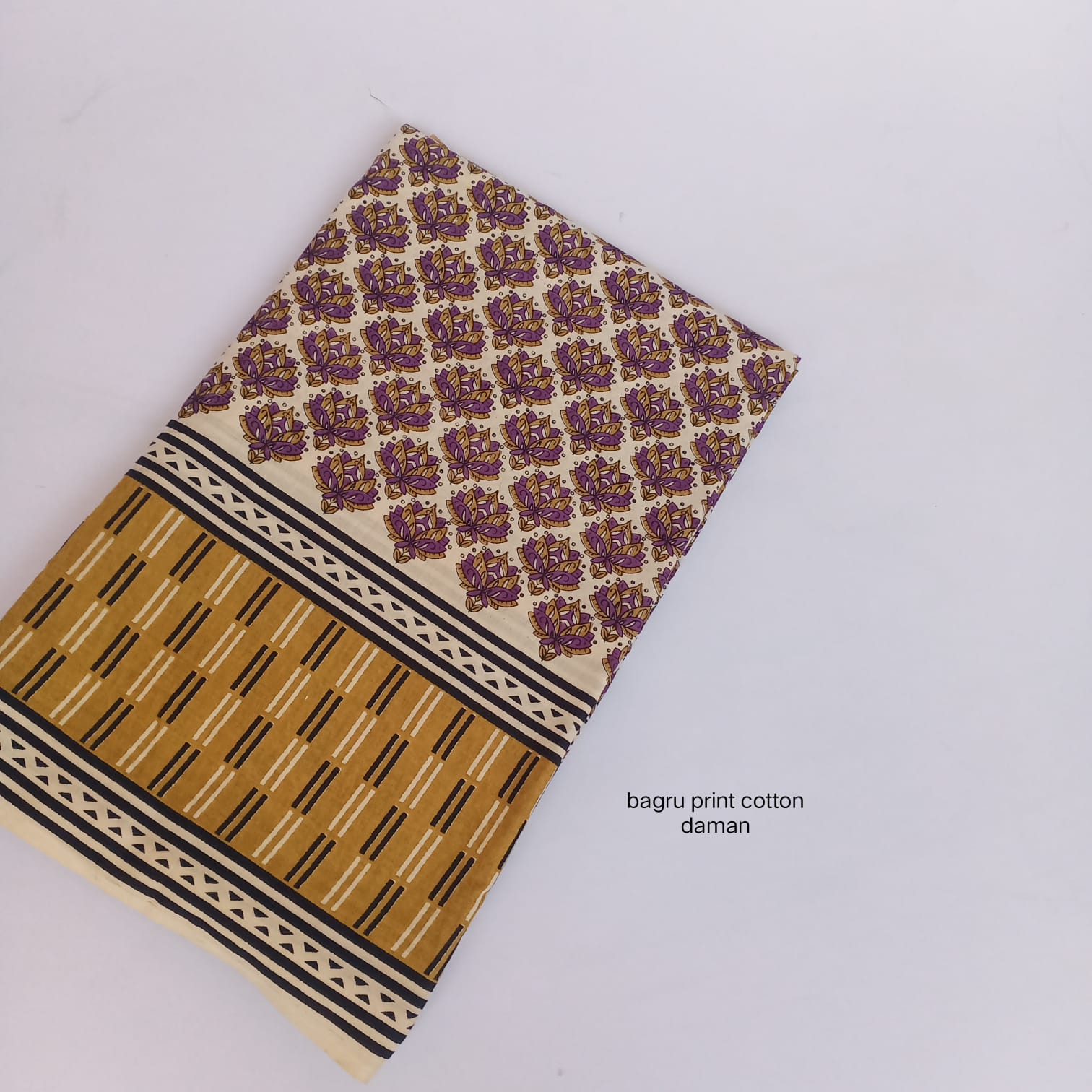 Maroon Bagru handblock cotton fabric featuring classic daman border floral motifs, handcrafted wholesale by Fabtexs